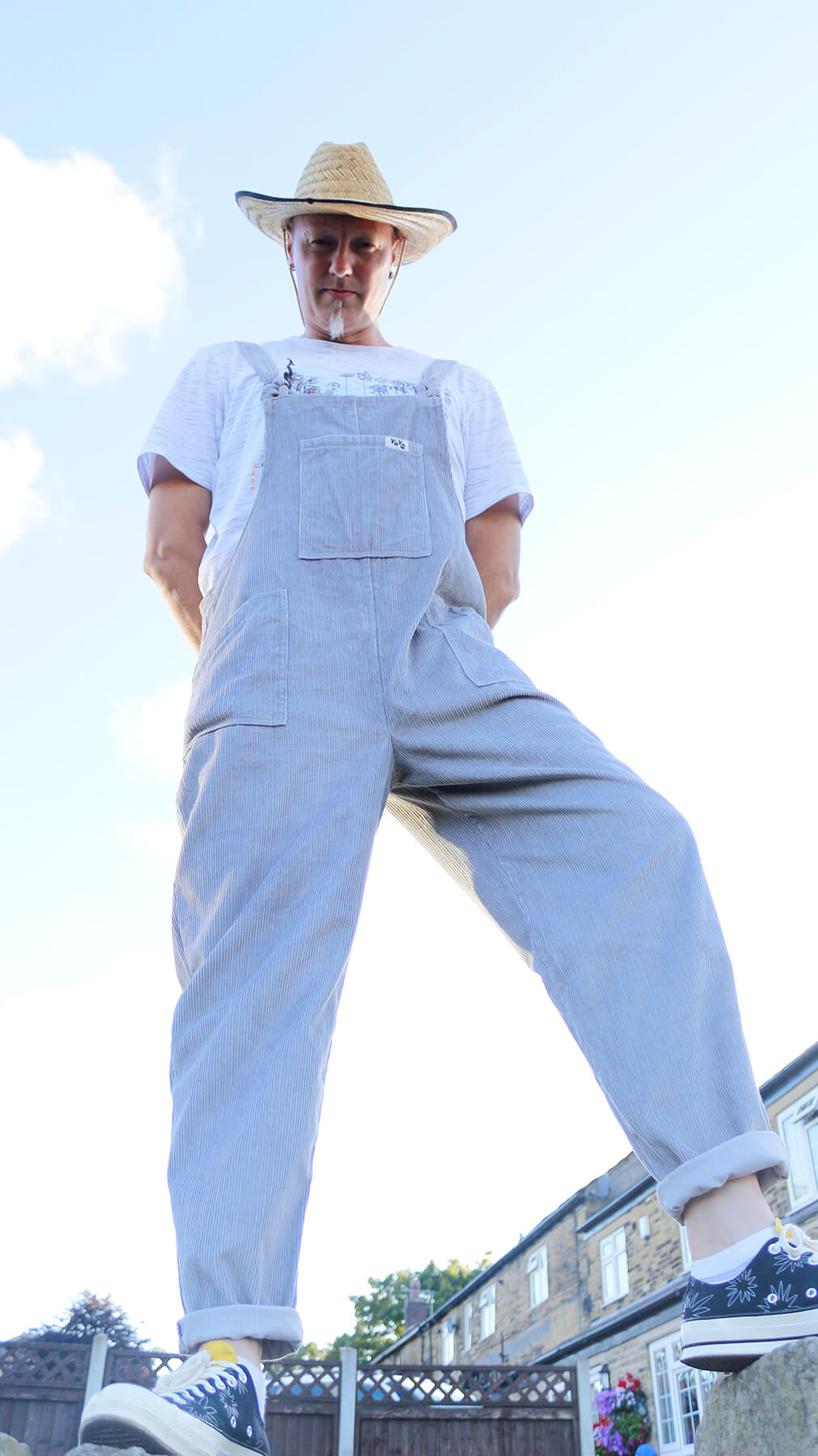 male model posing looking down at the camera, picture taken from below, full front view of YAYS PRIMO: Corduroy Cotton Dungaree - Dove Grey