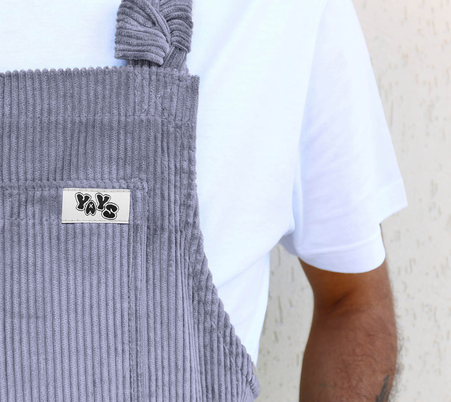 product image of YAYS PRIMO: Corduroy Cotton Dungaree - Dove Grey, close-up of front pocket and logo tag