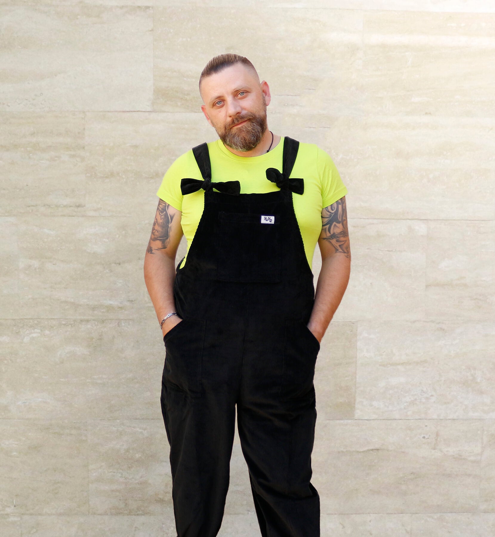 Male model, posing wearing YAYS dungarees in Pine Green, front view