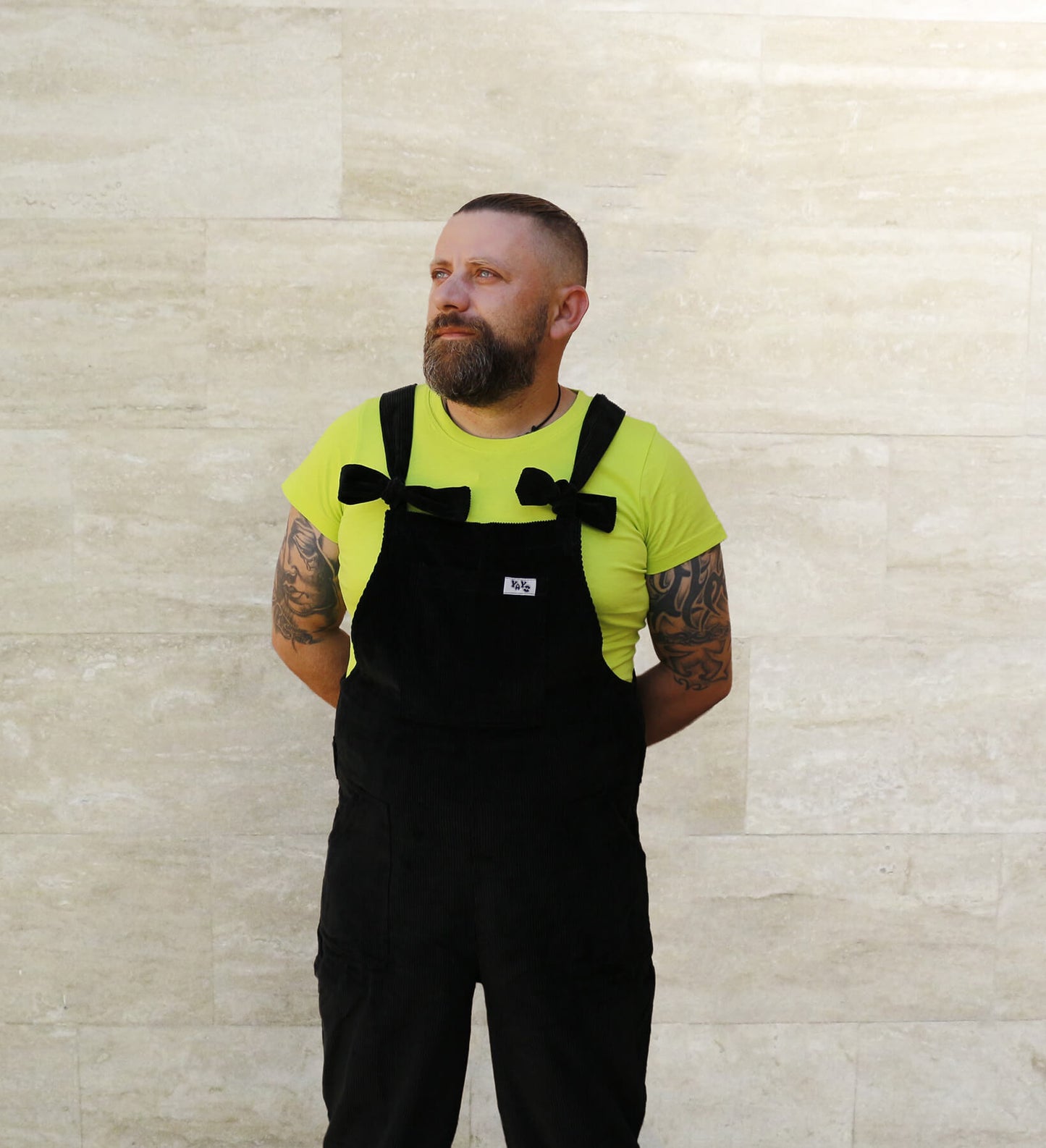 Male model, posing wearing YAYS dungarees in Pine Green, front view