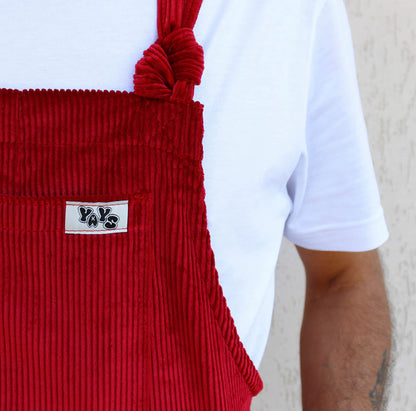 close-up of ysys dungaree in scarlet red, front pocket and YAYS logo details showing