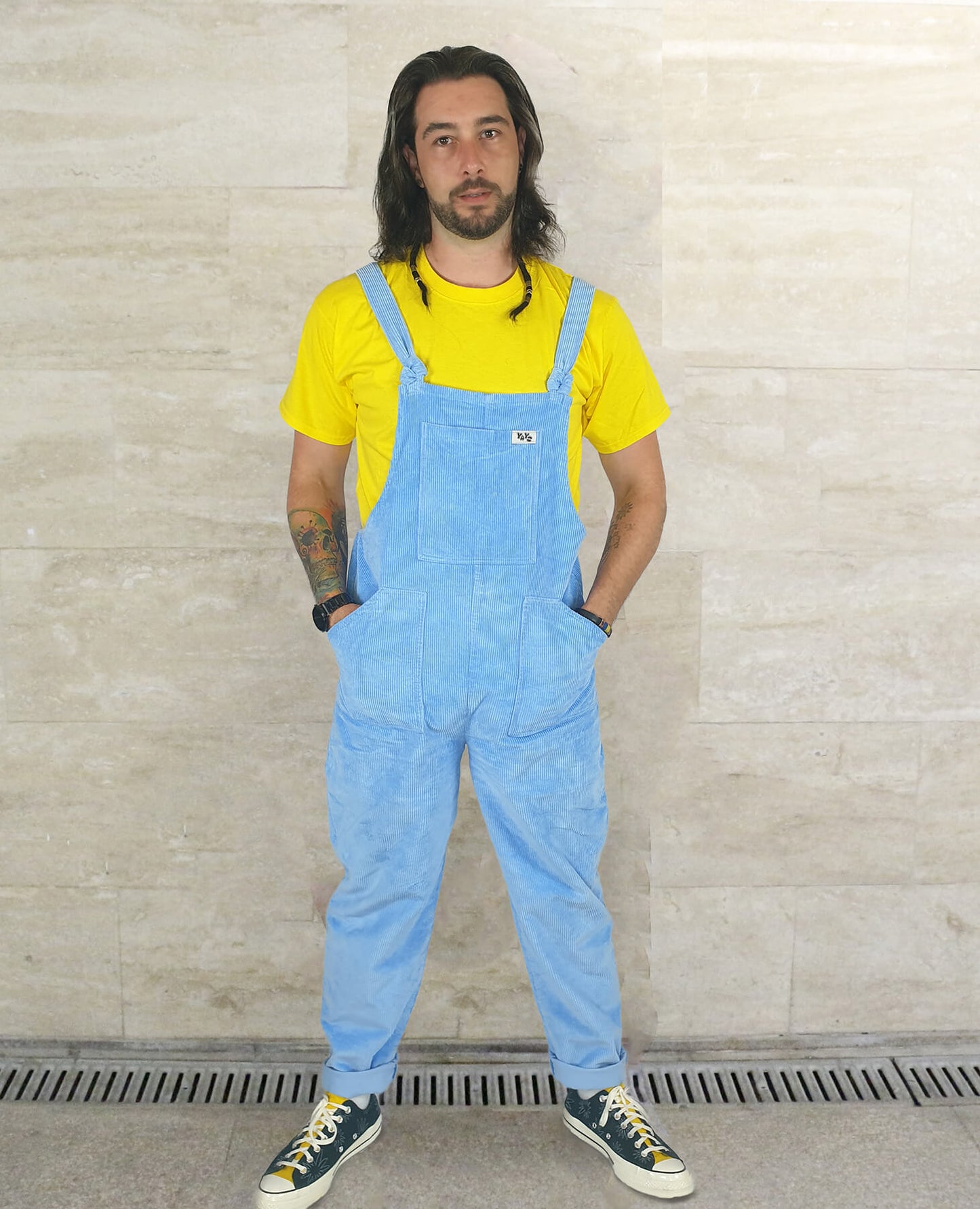 Male model posing in Yays corduroy cotton dungarees in Serenity Blue, front view