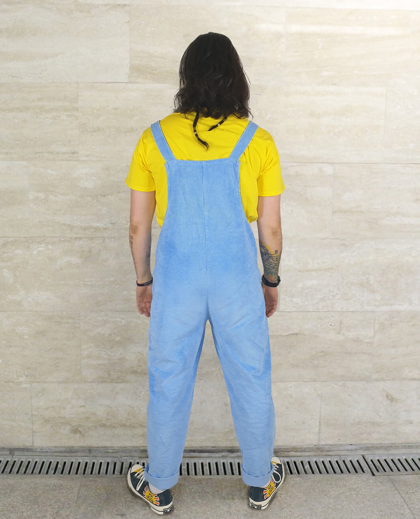 male model wearing YAYS unisex overalls in Serenity Blue, back view