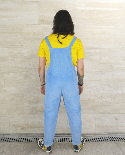 male model wearing YAYS unisex overalls in Serenity Blue, back view