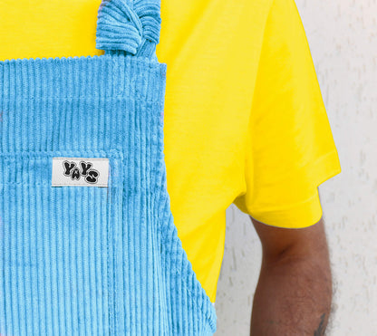 close-up, YAYS unisex dungarees in Serenity Blue, front pocket and logo details showing