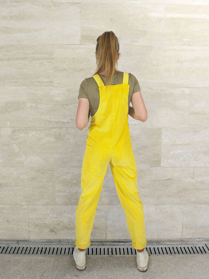 woman wearing Yays cordduroy dungarees in Sunshine Yellow, back view