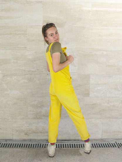 woman wearing Yays unisex corduroy overalls, back side view